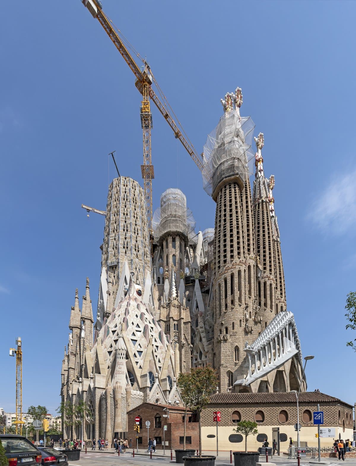 The towers and facade of the Sagrada FamĂlia basilica in Barcelona, designed by Antoni GaudĂ